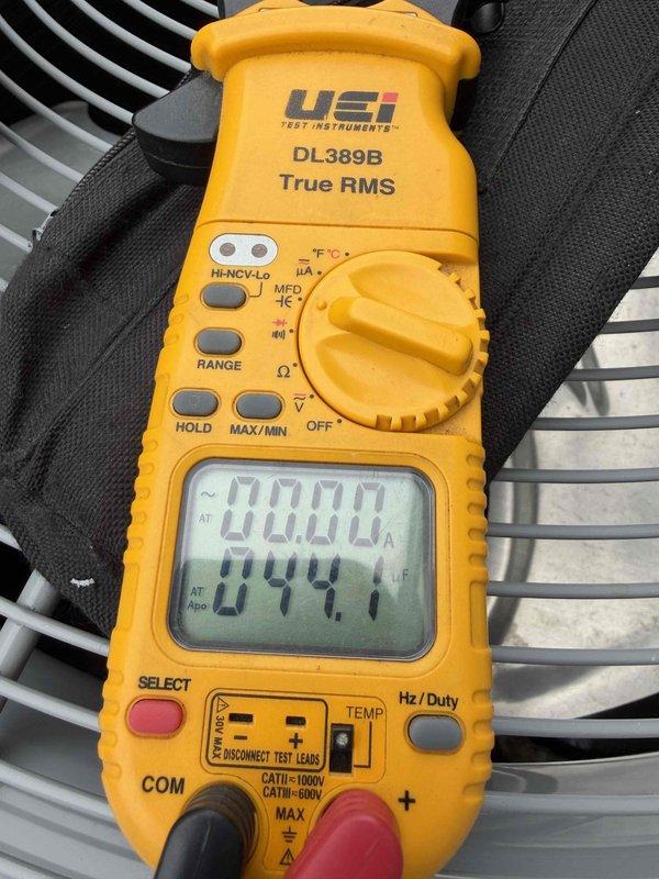 Responded to first-time cooling service call for residential HVAC system. Upon arrival, performed diagnostic evaluation of Carrier furnace and cooling system using digital multimeter to measure electrical parameters, recording capacitor readings of 441.1 MFD. Conducted comprehensive system inspection including visual assessment of ductwork connections, ventilation components, and overall equipment condition to ensure proper operation for the cooling season.