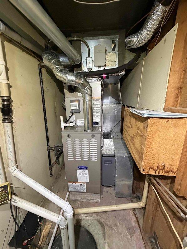 Responded to first-time cooling service call for residential HVAC system. Upon arrival, performed diagnostic evaluation of Carrier furnace and cooling system using digital multimeter to measure electrical parameters, recording capacitor readings of 441.1 MFD. Conducted comprehensive system inspection including visual assessment of ductwork connections, ventilation components, and overall equipment condition to ensure proper operation for the cooling season.