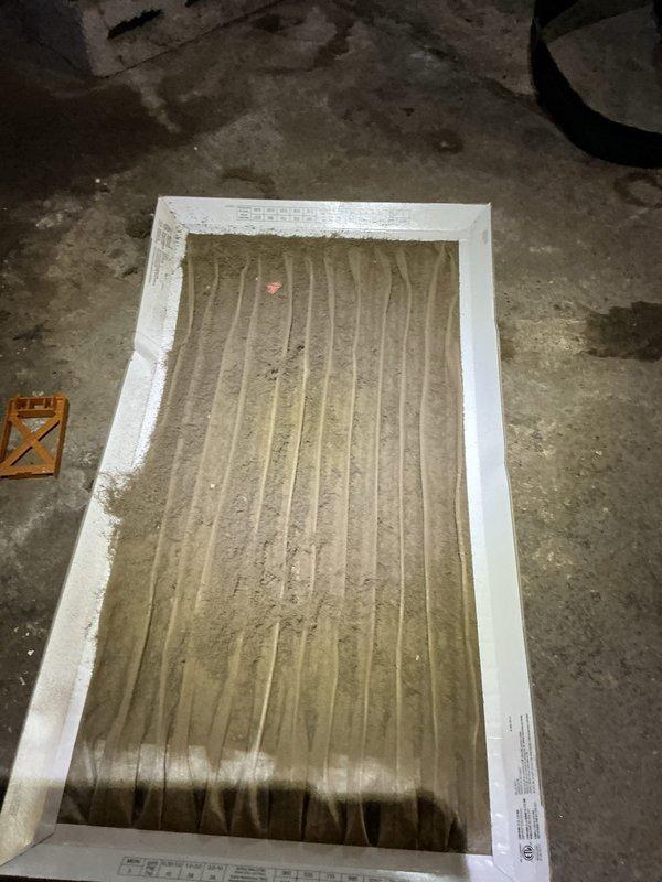 Responded to no cooling complaint on system that had been recharged two weeks prior but lost refrigerant charge. Performed diagnostic evaluation and leak search procedures on air conditioning system. Documented heavily soiled air filter with significant dust and debris accumulation, and inspected ductwork and system components. System showed signs of refrigerant leak requiring further repair to restore proper cooling operation.