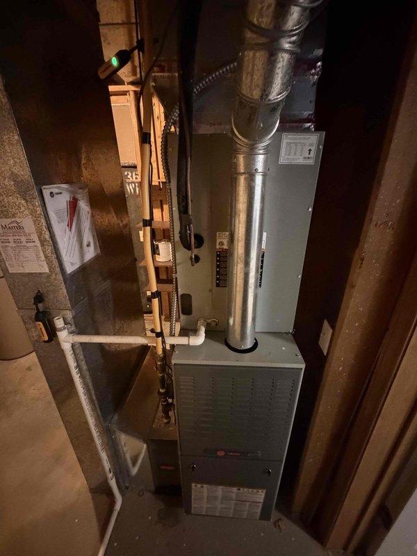 Completed final prepaid cooling system maintenance visit on residential air conditioning unit. Performed comprehensive inspection of electrical components, capacitor, and control panel within HVAC system housing. All components found to be operating within normal parameters, with capacitor connections secure and electrical wiring properly routed. System tested and confirmed ready for upcoming cooling season.