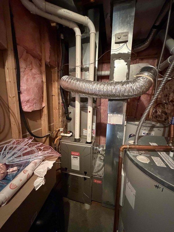 Completed comprehensive AC tune-up on residential split system. Performed visual inspection of indoor furnace unit and outdoor condensing unit, verifying proper installation and component condition. Inspected electrical connections at outdoor disconnect panel, including capacitor and contactor assembly with associated wiring terminations. All components found operating within normal parameters, system ready for cooling season.