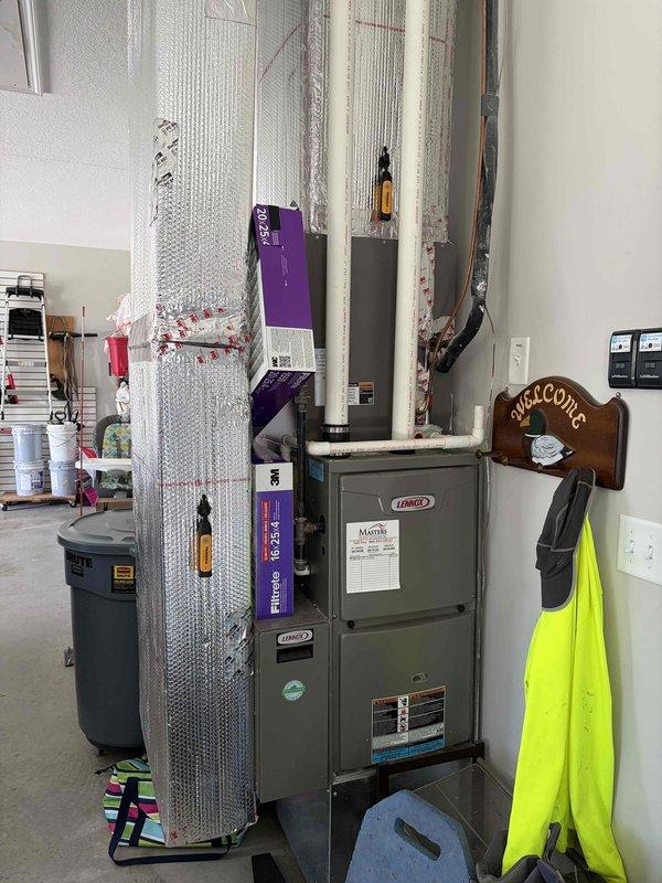 Completed scheduled cooling system maintenance on residential Lennox HVAC unit. Performed comprehensive inspection of furnace and air handler components, including examination of electrical connections, contactors, and terminal blocks. Verified proper wire terminations and grounding connections, checked all safety labels and warnings for visibility. Inspected ductwork installation and metallic insulation for integrity. System operational and ready for cooling season.
