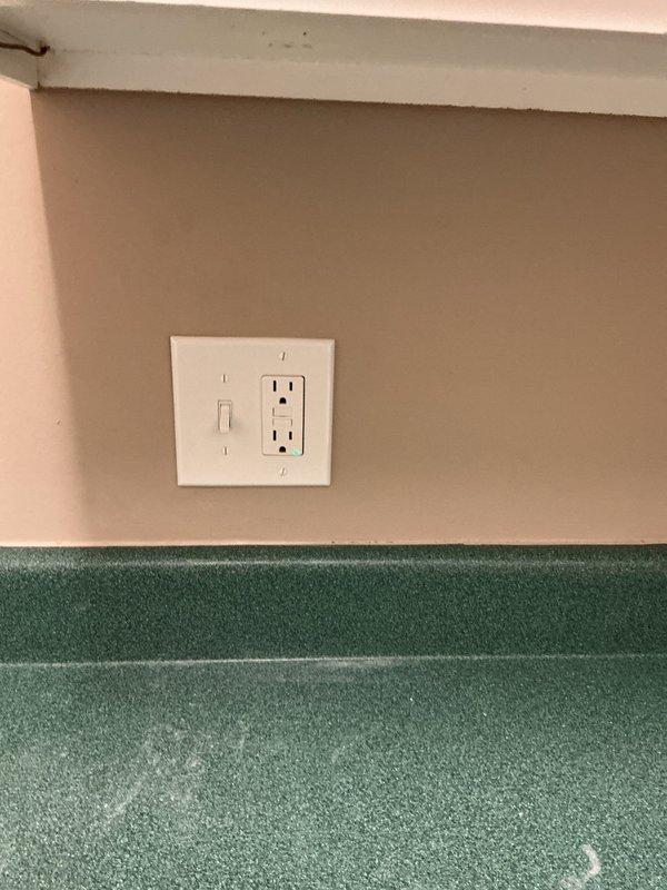 Relocated electrical receptacles to lower position behind washer and dryer area. Opened wall cavity to access existing wiring, installed new outlet boxes at reduced height for improved appliance accessibility, and patched drywall around plumbing chase containing water supply valves. Verified proper GFCI protection and confirmed all connections met current electrical code requirements.