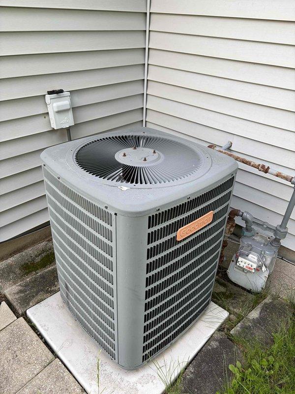Completed comprehensive air conditioning tune-up on residential cooling system. Performed standard preventive maintenance procedures including inspection of outdoor condenser unit, verification of electrical connections and wire specifications, and assessment of refrigerant lines showing minor surface corrosion. Unit operational and system functioning within normal parameters at time of service completion.