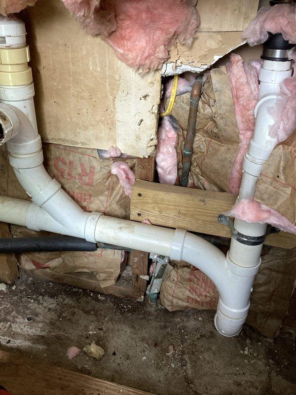 Responded to service call for preventative kitchen drain maintenance. Successfully snaked kitchen drain line to clear buildup and restore proper flow, preventing potential clogs. Accessed drainage system through crawl space, where PVC drain lines showed signs of age but remained functional. Provided estimate for garbage disposal replacement as requested by homeowner. All drainage systems tested and confirmed operational upon completion.