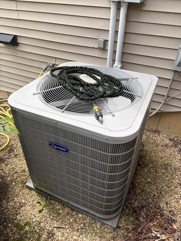 Completed first annual air conditioning maintenance visit on Carrier condensing unit. Performed comprehensive system inspection including electrical measurements with clamp meter, verified proper amperage draw, and inspected condenser coil fins. Unit operating within normal parameters. Maintenance agreement active through October 2027, with heating system visit to be scheduled separately.