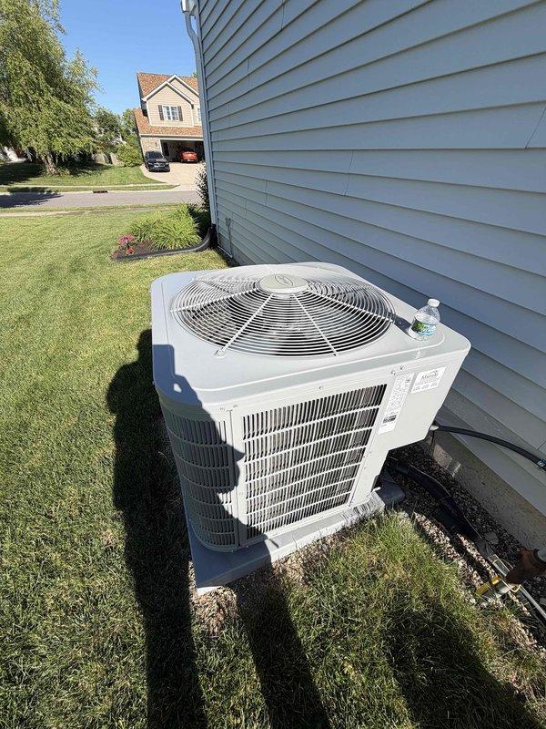 Completed routine maintenance on residential air conditioning system. Performed comprehensive inspection of outdoor condenser unit, verified proper operation of fan motor and compressor, and took electrical measurements using digital multimeter to confirm system performance within manufacturer specifications. Discussed membership renewal options and scheduled future heating system maintenance visit with property owner.