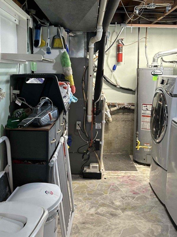 Conducted on-site assessment for complete HVAC system replacement, evaluating existing Lennox gas furnace and air conditioning equipment located in basement utility area. Documented current installation configuration including air handler, refrigerant lines, PVC condensate drainage, and electrical connections. Additionally evaluated existing tank-style water heater for potential tankless water heater conversion, noting current venting arrangement and gas supply infrastructure to provide comprehensive replacement quotes for both HVAC system and water heating equipment.