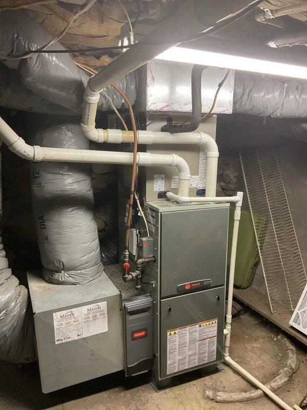 Completed full installation of Carrier Performance Series two-stage heat pump system, including 27TPA836A003 outdoor unit and CVAVA3621XMA uncased evaporator coil. Reconnected to existing line set after flushing and pressure testing, installed new 2" PVC condenser pad with pea gravel base, and reconnected all existing supply and return ductwork. Removed and recycled old equipment, registered warranty, explained system and thermostat operation, and conducted post-installation quality assurance walkthrough with senior technician verification.
