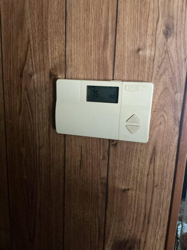 Conducted comprehensive estimate for complete air conditioning system and evaporator coil replacement versus repair options on existing HVAC system with basement furnace installation. Evaluated current equipment configuration including gray furnace unit, dark air handler cabinet, copper refrigerant lines, and white PVC ventilation piping to determine replacement specifications. Assessed thermostat functionality, existing ductwork connections, electrical disconnect requirements, and drainage system compatibility for new equipment installation, providing homeowner with detailed comparison between repair and full system replacement options.