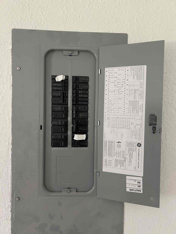Conducted site evaluation for adding heating and cooling system to property currently without HVAC. Assessed electrical panel capacity and existing infrastructure to determine feasibility of either ductless mini-split system or traditional forced-air furnace with central air conditioning. Photographed 100-amp electrical service panel to verify available capacity for new HVAC equipment installation and presented multiple system options for customer consideration.