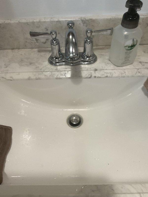 Responded to service call for leak under kitchen sink and slow-draining bathroom tub. Upon arrival and client consultation, prioritized addressing the kitchen sink leak as primary concern. Completed repair of under-sink plumbing leak, restoring proper function and eliminating water damage risk. Bathroom tub slow drain issue documented for future service appointment when drain machine equipment becomes available.