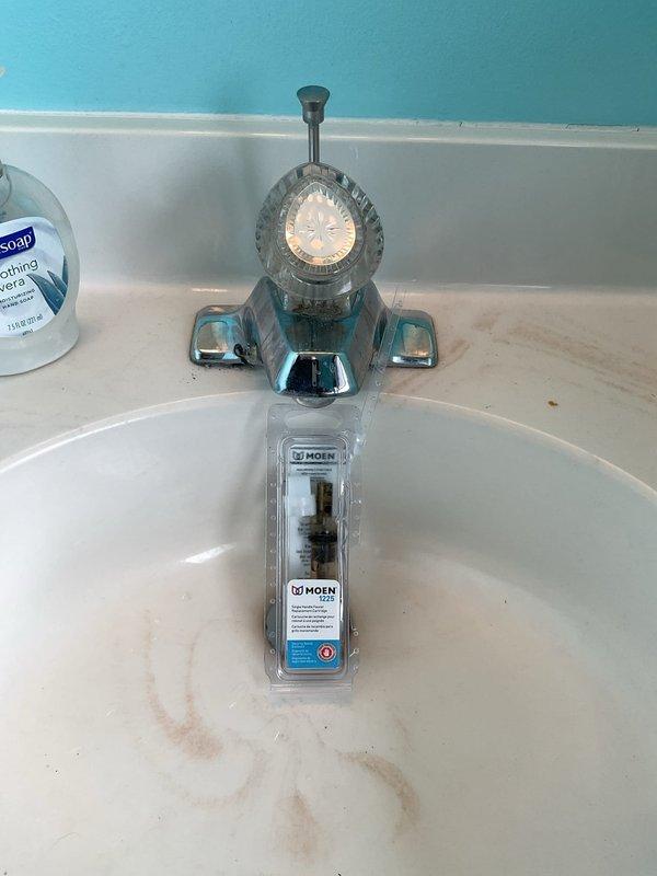 Conducted initial assessment for bathroom lavatory faucet repair requiring Moen single-handle cartridge replacement. Documented existing plumbing conditions in basement utility area showing copper supply lines with shut-off valves. Coordinated with property owner to obtain manufacturer-specific Moen cartridge for installation during follow-up visit, at which time two 1/2" ball valves and two 1/2" boiler drains will be installed and plumbing inspection will be completed.