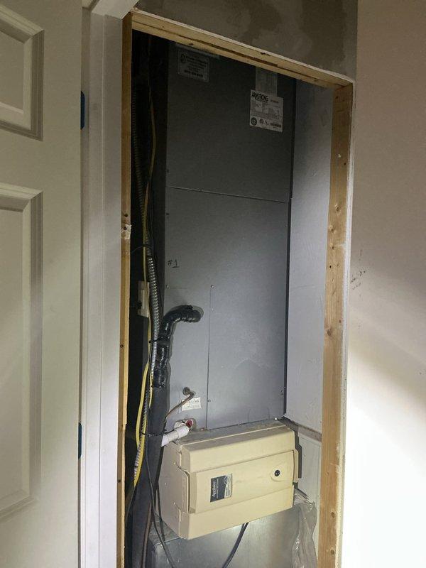 Responded to no cooling call on commercial system requiring 12 pounds of R22 refrigerant. Assessed existing equipment in basement mechanical room, including aging air handler and associated components showing significant wear and rust accumulation. Provided estimate for minimum-specification replacement system as customer requested most economical solution for complete HVAC replacement rather than repair of R22-dependent equipment.