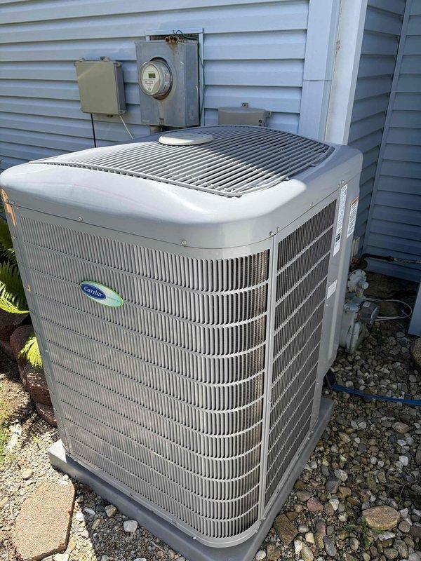Performed comprehensive cooling season tune-up on residential Carrier HVAC system, including outdoor condenser unit and indoor furnace. Completed thorough cleaning of condenser coils, inspection of electrical connections, refrigerant level verification, and system performance testing. All components found operating within manufacturer specifications with no deficiencies noted.