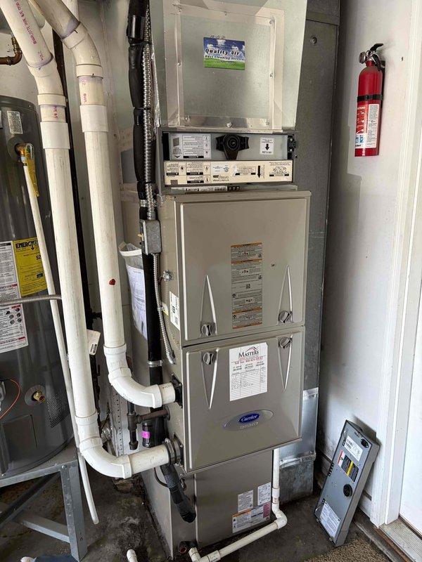 Performed comprehensive cooling season tune-up on residential Carrier HVAC system, including outdoor condenser unit and indoor furnace. Completed thorough cleaning of condenser coils, inspection of electrical connections, refrigerant level verification, and system performance testing. All components found operating within manufacturer specifications with no deficiencies noted.