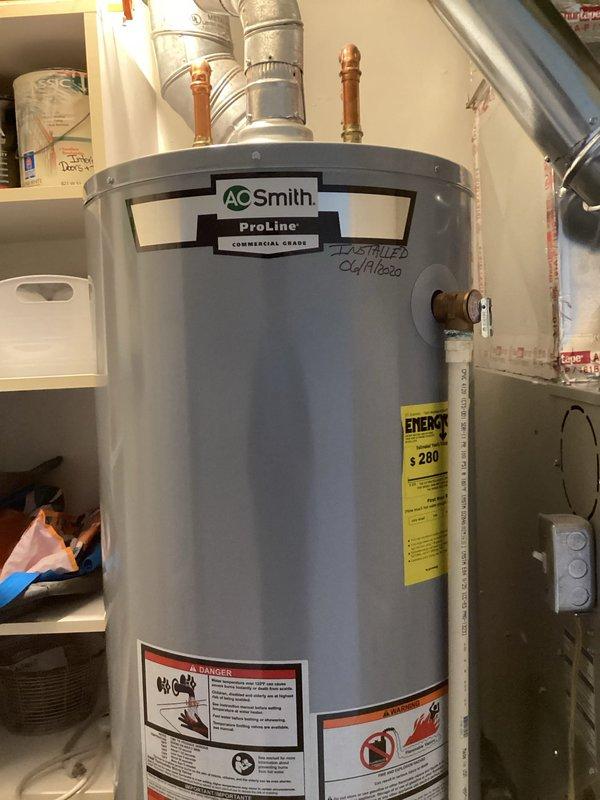 Responded to service call for strong sulfur odor in hot water from A.O. Smith ProLine commercial grade water heater installed in August 2020. Performed comprehensive maintenance service including anode rod inspection and replacement to address bacterial sulfate contamination causing hydrogen sulfide gas production. Drained tank completely and performed thorough flush to remove sediment buildup and mineral deposits from tank bottom. Inspected all copper supply lines, shut-off valves, and pressure relief valve for proper operation. Verified temperature and pressure settings within manufacturer specifications. Tested hot water quality post-service to confirm elimination of sulfur smell. Unit returned to normal operation with improved water quality and extended service life expected from preventative maintenance performed.