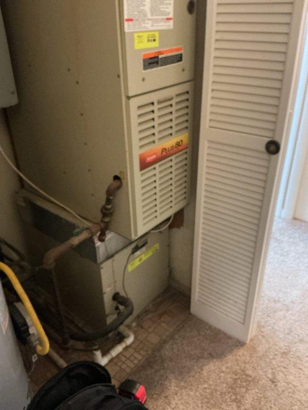 Arrived on-site to provide replacement estimate for non-functioning air conditioning system following initial diagnostic visit. Inspected existing Payne furnace installation and associated electrical panel to assess current HVAC configuration and determine replacement equipment specifications and requirements.
