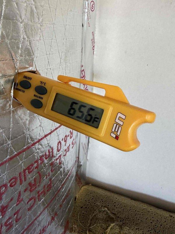 Completed scheduled prepaid cooling system maintenance and inspection on residential air conditioning unit. Performed comprehensive system evaluation including temperature differential measurements, verified proper operation of outdoor condensing unit, and inspected electrical disconnect and associated wiring. All components found operating within normal parameters with supply air temperature reading 65.6°F at register, indicating adequate cooling performance and refrigerant charge.