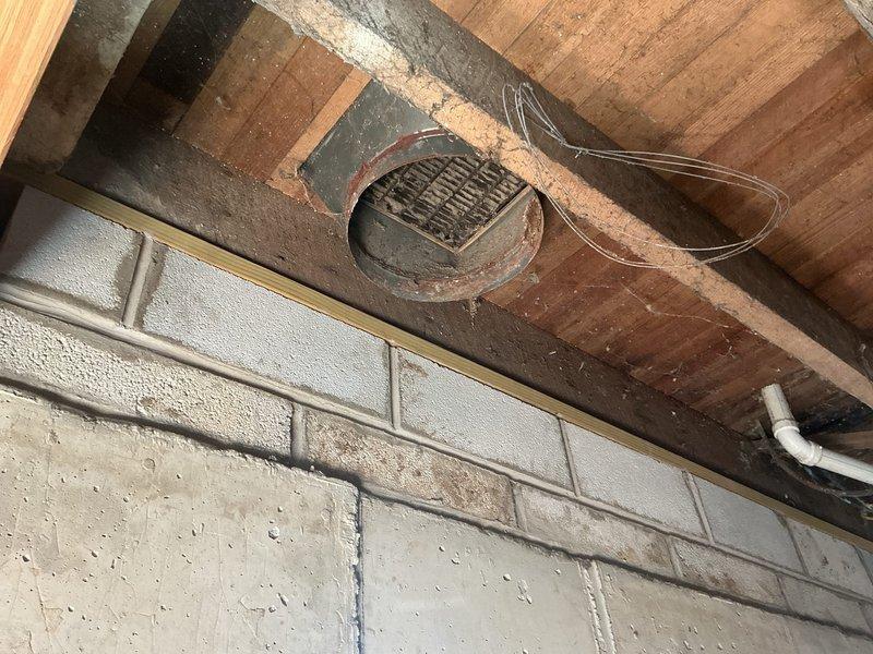 Conducted on-site evaluation of existing 50-year-old HVAC system in basement undergoing construction to provide replacement estimate for gas furnace and air conditioning unit. Assessed current infrastructure including ductwork, electrical service panel, and ventilation components to determine equipment specifications and installation requirements for complete system replacement.