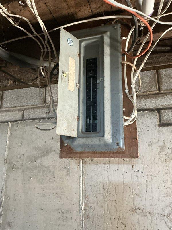 Conducted on-site evaluation of existing 50-year-old HVAC system in basement undergoing construction to provide replacement estimate for gas furnace and air conditioning unit. Assessed current infrastructure including ductwork, electrical service panel, and ventilation components to determine equipment specifications and installation requirements for complete system replacement.