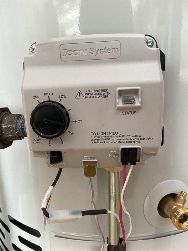 Installed a 50-gallon natural gas water heater in garage, mounting unit on an elevated stand as requested by property owner. Connected copper supply lines, installed blue expansion tank, and integrated gas control valve with temperature settings. Verified proper venting, tested pilot ignition system, and confirmed all connections were secure and operational per manufacturer specifications.