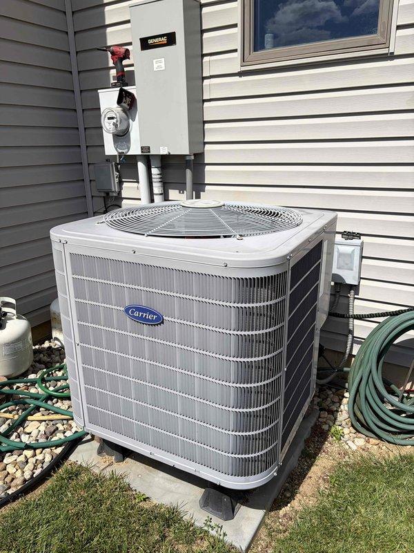 Completed first prepaid cooling season preventative maintenance inspection on Carrier heat pump system. Performed comprehensive system evaluation including visual inspection of outdoor condenser unit, electrical connections at disconnect box, and operational testing. Measured and documented system voltage at 235.0V AC, confirming proper electrical supply to equipment. Verified condenser unit mounting, refrigerant line connections, and overall equipment condition. All components found operating within normal parameters with no deficiencies noted. Customer reminded to schedule heating season maintenance appointment before expiration of prepaid service agreement.