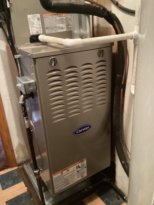 Completed full HVAC system replacement including installation of Carrier 26SCA430N003 single-stage air conditioner, Carrier CVAVA3617XMA evaporator coil, and Carrier 58SB0B070M17-12 single-stage gas furnace with Honeywell T6 thermostat. Removed and recycled existing equipment, then reconnected to existing line set after flushing and pressure testing for optimal performance. Installed new 2" PVC condenser pad with pea gravel base for proper outdoor unit support and drainage. 

Performed LP conversion on furnace unit to accommodate propane fuel source. Installed Honeywell 4" media air cleaner for improved indoor air quality. Reconnected all existing supply and return ductwork to new equipment. Installed new electrical disconnect and whip for outdoor condenser unit with proper electrical connections. 

Completed comprehensive system startup and testing procedures to verify proper operation of all components. Provided thorough explanation of thermostat operation and system controls. Conduc