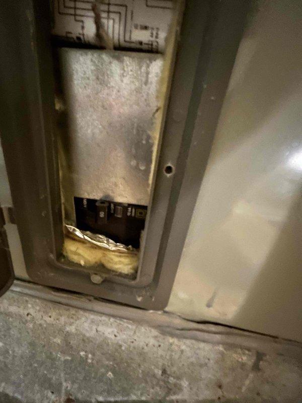 Conducted site assessment for air handler replacement and water softener installation at residential property. Inspected existing outdoor condensing unit with visible refrigerant lines and documented current system configuration. Evaluated electrical panel showing signs of moisture damage and corrosion, noting potential electrical service considerations for new equipment installation. Provided comprehensive replacement estimate covering air handler upgrade and water softener system integration with existing HVAC infrastructure.