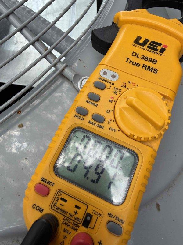 Completed final prepaid cooling system maintenance visit on residential air conditioning unit. Performed comprehensive seasonal inspection including electrical connection verification at contactor assembly, voltage testing with digital multimeter, and overall system operational assessment. All electrical terminals, wiring connections, and components found secure and functioning properly with no issues identified. Unit operating within normal parameters.