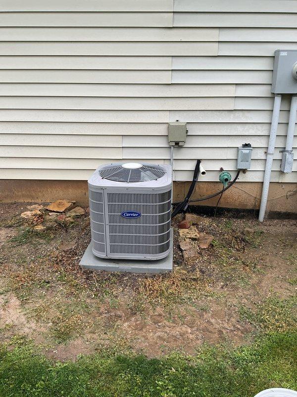 Completed routine maintenance on residential Carrier cooling system. Inspected outdoor condenser unit, verified proper operation of compressor and fan motor, checked refrigerant levels, and cleaned coils. Inspected indoor furnace unit and associated ductwork, confirmed proper airflow and electrical connections. System operating within normal parameters with membership valid through November 2026.