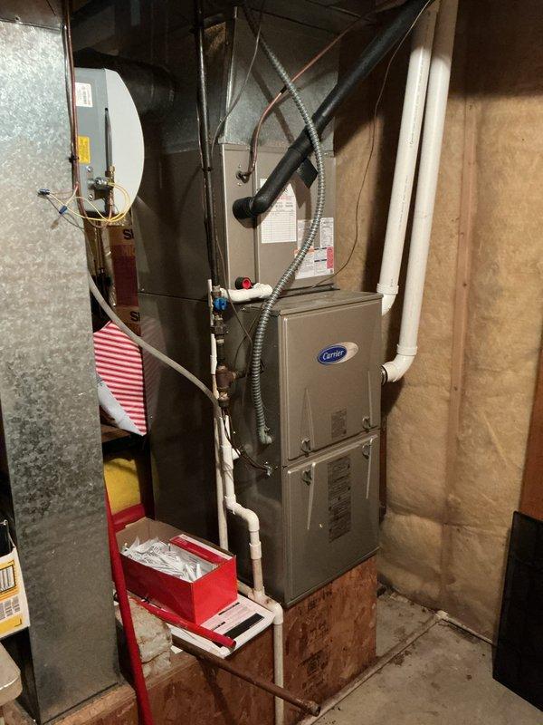 Completed routine maintenance on residential Carrier cooling system. Inspected outdoor condenser unit, verified proper operation of compressor and fan motor, checked refrigerant levels, and cleaned coils. Inspected indoor furnace unit and associated ductwork, confirmed proper airflow and electrical connections. System operating within normal parameters with membership valid through November 2026.