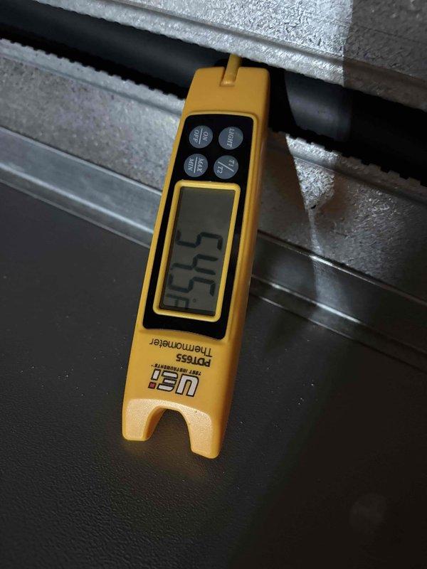Completed preventive maintenance inspection on geothermal heating and cooling system located in basement. Performed comprehensive cooling mode evaluation including temperature differential measurements, airflow verification through ductwork system, and operational testing of all system components. Unit operating within normal parameters with supply air temperature reading of 55.5°F, confirming proper heat exchange function and adequate cooling performance for continued system efficiency.