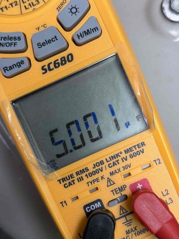 Performed seasonal air conditioning tune-up including system cleaning and comprehensive operational check. Utilized digital multimeter to verify electrical readings and measured system temperatures, confirming unit operating within manufacturer specifications at 40.5°F. All components inspected and system left in proper working condition.
