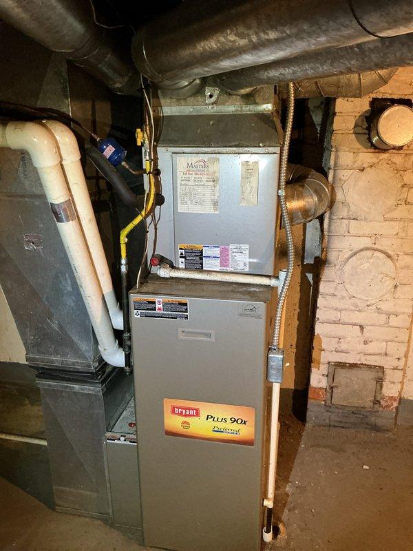 Completed comprehensive AC tune-up on Bryant Plus 90t furnace system in residential basement installation. Performed standard maintenance protocol including filter inspection, electrical connection verification, condensate drain line assessment, and system operational testing. All equipment found operating within manufacturer specifications; customer expressed interest in renewing service membership for continued preventive maintenance coverage.