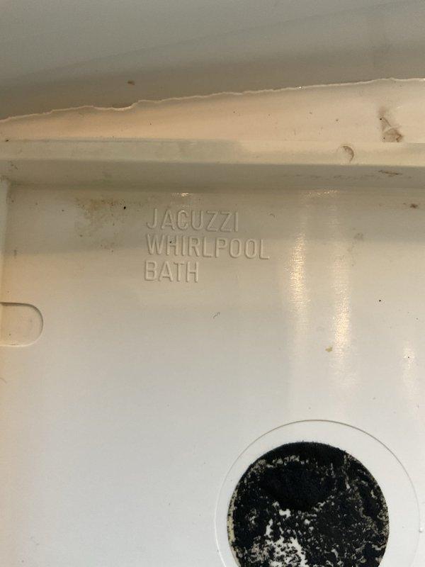 Responded to service call for leaking faucet on Jacuzzi whirlpool bathtub. Upon inspection, identified corroded copper supply lines with visible oxidation and aging flexible supply hoses requiring attention. Assessed plumbing connections mounted to wall, noting deteriorated condition of piping system with multiple connection points showing signs of wear. Also evaluated kitchen sink per customer request for potential future replacement needs.