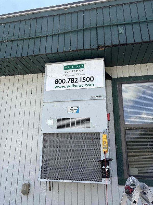Responded to no cooling call at Williams Scotsman doublewide site trailer where rooftop unit was repeatedly tripping main breaker at electrical pole. Upon arrival, inspected Bryk brand heat pump system and associated electrical components including wall-mounted disconnect box. Diagnosed electrical fault causing breaker trip, performed necessary repairs to resolve issue, and restored cooling operation to unit. System tested and verified operational upon completion.