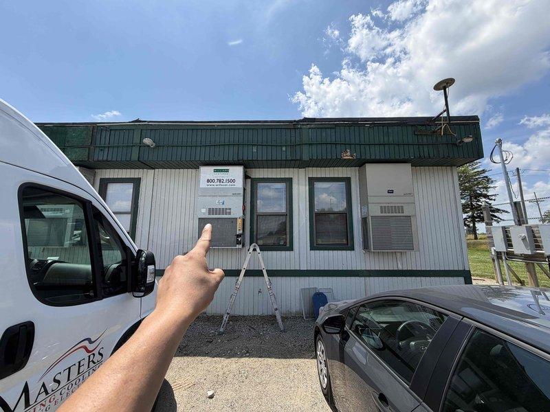 Responded to no cooling call at Williams Scotsman doublewide site trailer where rooftop unit was repeatedly tripping main breaker at electrical pole. Upon arrival, inspected Bryk brand heat pump system and associated electrical components including wall-mounted disconnect box. Diagnosed electrical fault causing breaker trip, performed necessary repairs to resolve issue, and restored cooling operation to unit. System tested and verified operational upon completion.