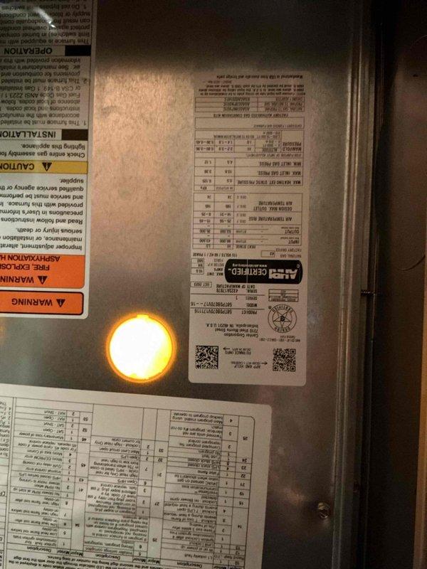Completed prepaid cooling maintenance on Carrier furnace system with Masters air handler installed in closet utility space. Performed standard seasonal inspection including filter check, airflow verification, and system operational testing. Unit found in good working condition with all safety labels and specifications clearly visible; system responding normally with indicator light showing proper operation.