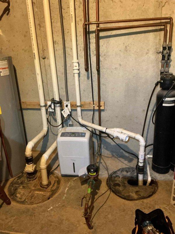 Completed final prepaid cooling maintenance visit on Carrier HVAC system. Performed comprehensive inspection of furnace unit, verified proper operation of all mechanical components, checked refrigerant lines and connections, and confirmed adequate airflow through ductwork. Documented equipment condition with photographs showing basement mechanical room setup including gas piping, electrical connections, and PVC drainage lines all functioning within normal parameters.
