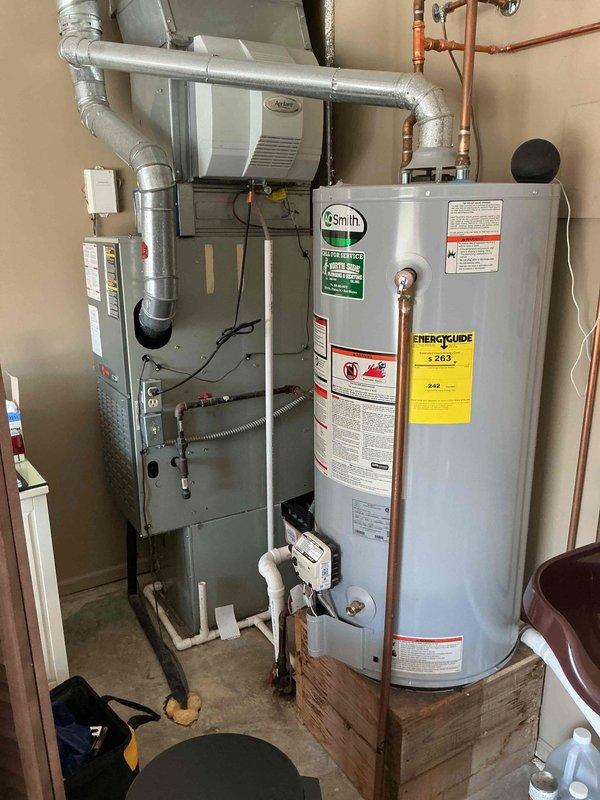Completed comprehensive cooling system maintenance on residential HVAC unit. Accessed equipment through garage entry, performed standard preventive maintenance procedures including inspection of indoor furnace components and outdoor condensing unit. System operating within normal parameters with maintenance agreement valid through July 2026. Documented equipment condition with photographs and verified all components functioning properly. Customer requested scheduling information for upcoming heating system maintenance visit.