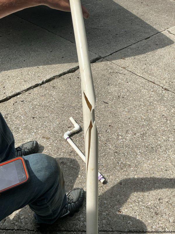 Responded to callback for non-operational AC unit after breaker replacement failed to restore power. Verified attic condensate drain line installation and repositioned condensate pan to prevent water leakage into living space. Inspected rooftop PVC drain line routing and repaired sections with improper connections. Unit restored to operational status with proper drainage confirmed.