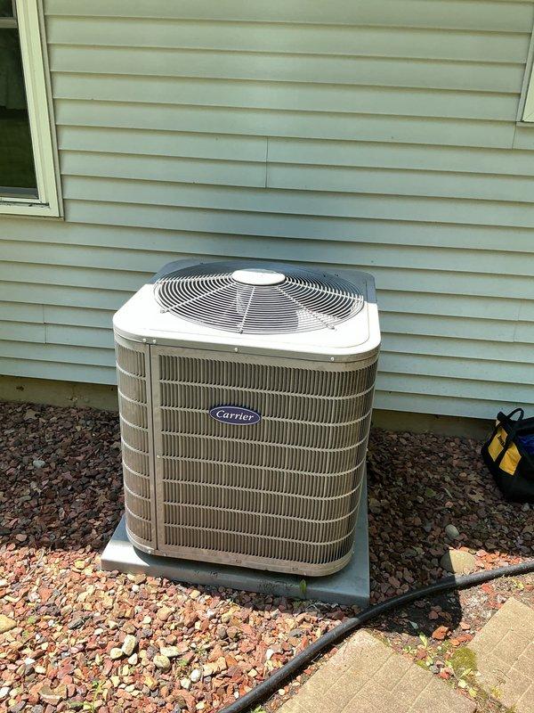 Completed preventative maintenance tune-up on 9-year-old Carrier split system air conditioning unit. Investigated customer complaint of intermittent noise occurring approximately every 10 minutes from outdoor condenser. Performed comprehensive system inspection including indoor furnace/air handler and outdoor condensing unit. Checked electrical connections, refrigerant levels, and operational cycling. Cleaned condenser coils, inspected fan motor and blades for wear or debris causing noise issue. Verified proper airflow, temperature differential, and thermostat operation. System operating within normal parameters at time of service completion.