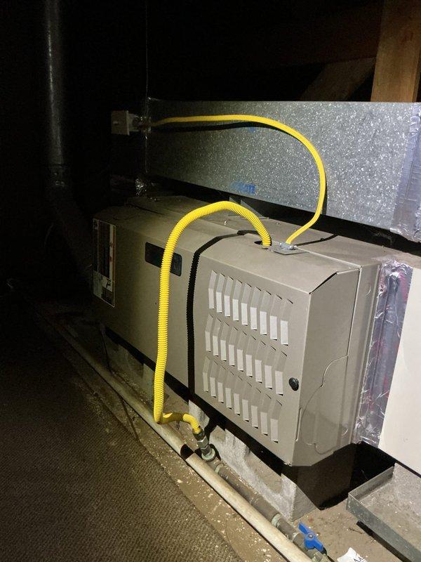 Completed comprehensive AC tune-up on residential split system, including inspection of attic-mounted air handler and outdoor condenser unit. Verified proper operation of all components, checked refrigerant lines, electrical connections, and airflow. Noted vegetation growth around condenser unit that may require clearance for optimal performance and recommended scheduling future heating system maintenance.