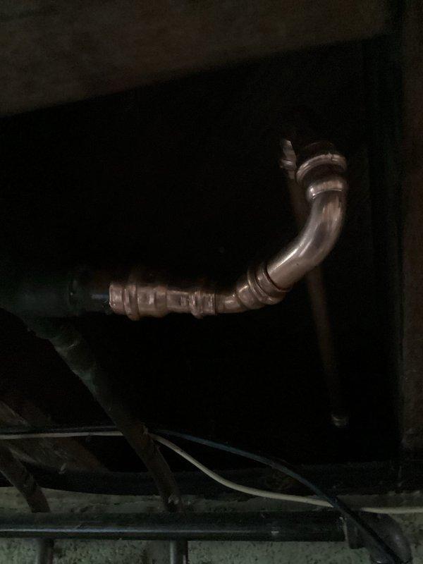 Responded to callback for outdoor plumbing fixtures. Inspected exterior hose bibs and shut-off valve housed in recessed wall panel with brass fittings showing age and wear. Evaluated valve condition and outdoor faucet functionality per owner's request for replacement. Documented current state of fixtures and accessed crawlspace to trace supply lines and assess copper piping connections. Return visit scheduled to complete shut-off valve replacement or repair and install new outdoor faucets as specified by property owner.