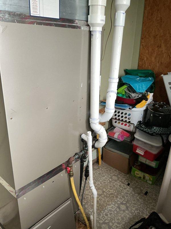 Completed comprehensive AC tune-up on ground floor system at residential property with two HVAC systems. Performed standard maintenance procedures on Carrier outdoor condensing unit and indoor air handler, including inspection of all major components, electrical connections, refrigerant levels, and airflow. All systems operating within normal parameters upon completion of preventative maintenance service.