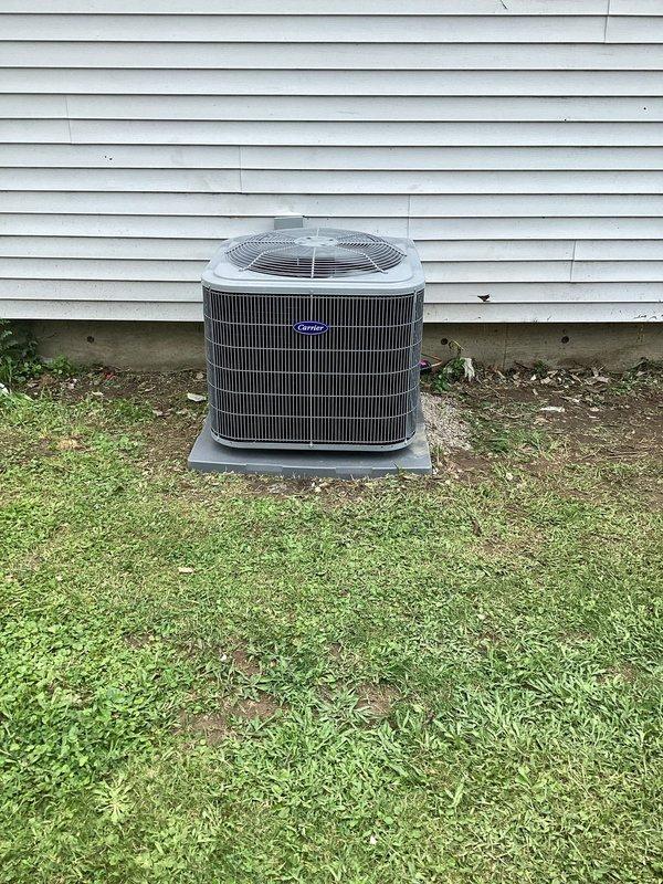 Completed full HVAC system replacement including installation of Carrier 26SCA436N003 Comfort Series single-stage air conditioner, Carrier CVAVA4217XMA evaporator coil, and Carrier 59TP7A080V17-16 Performance 97 Series two-stage gas furnace with 80,000 BTU input capacity. Removed and recycled existing equipment, then positioned new condenser unit on concrete pad with proper clearances from structure. Reconnected unit to existing refrigerant line set after performing complete flush and pressure test to verify system integrity. Inside installation included furnace changeout utilizing standard installation kit for 80% to 90% efficiency upgrade, with evaporator coil mounted in plenum above furnace cabinet. Reconnected existing supply and return ductwork to new equipment, ensuring proper airflow and sealed connections throughout system. Performed refrigerant charging procedures and verified proper superheat and subcooling readings using digital manifold gauges, with system readings showing 