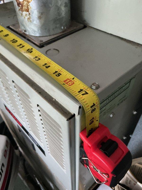 Completed comprehensive evaluation of existing Trane air conditioning system experiencing no cooling condition. Assessed outdoor condensing unit positioned on concrete pad with surrounding landscaping, noting operational failure requiring full system replacement. Documented equipment dimensions and current installation configuration, including existing electrical and refrigerant line routing along exterior wall. Observed corrosion on cylindrical component mounting, indicating age-related deterioration of system. Provided replacement options and recommendations for new AC unit installation to restore cooling capacity to residence.