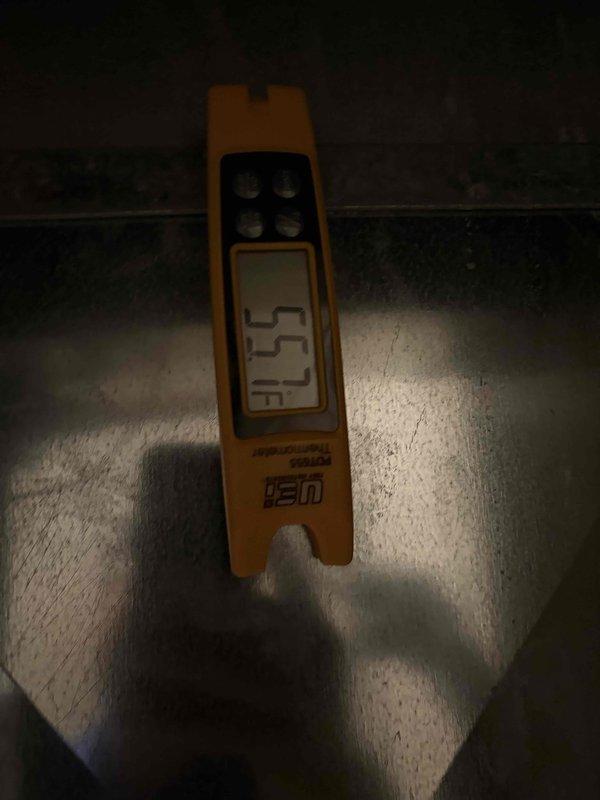 Completed scheduled preventive maintenance on cooling system as final prepaid visit. Performed standard system inspection including pressure diagnostics, with gauge readings indicating normal operating parameters near zero static pressure. Measured and recorded ambient temperature at 37.5 degrees, confirming proper system operation and performance within manufacturer specifications.