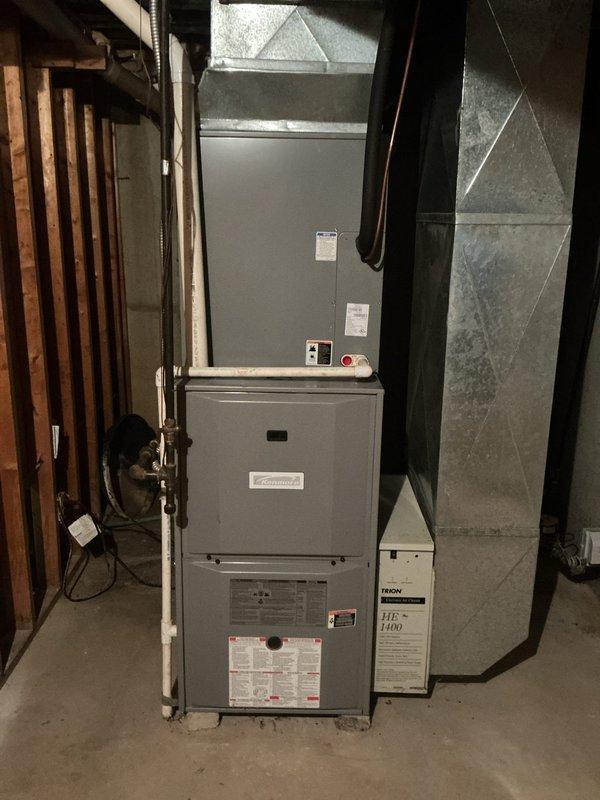 Conducted estimate consultation for complete HVAC system replacement on 18-year-old equipment experiencing repeated transformer failures. Inspected existing basement installation including vertical cabinet-style furnace, refrigerant lines, ductwork, and air filtration components. Equipment showed significant age-related wear with heavy dirt and debris accumulation on outdoor condenser unit and coils, indicating extended service life and reduced efficiency. Documented current system configuration with photographs and provided replacement options to address ongoing reliability issues and improve system performance.